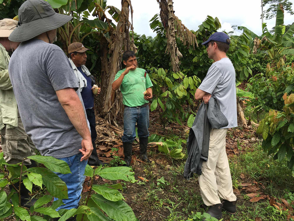 Goodnow Farms Cofounder Tom meets with local cacao farmers on a sourcing trip to Peru