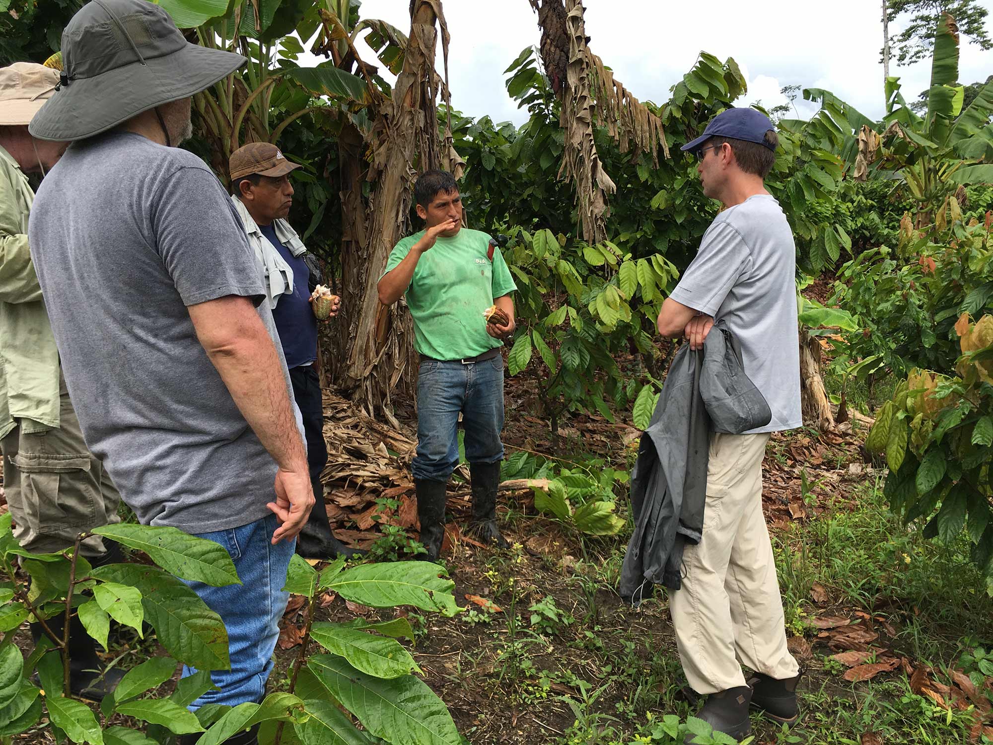 Goodnow Farms Cofounder Tom meets with local cacao farmers on a sourcing trip to Peru