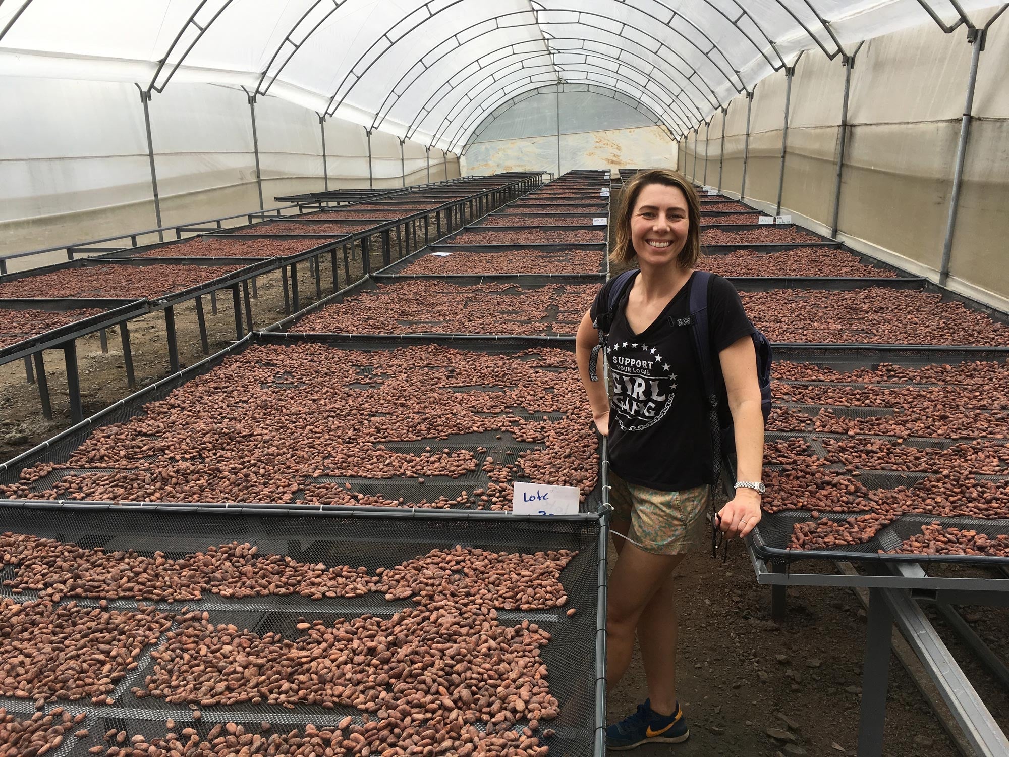 Goodnow Farms cofounder Monica in the new cacao drying facility at Impulsa Bacao