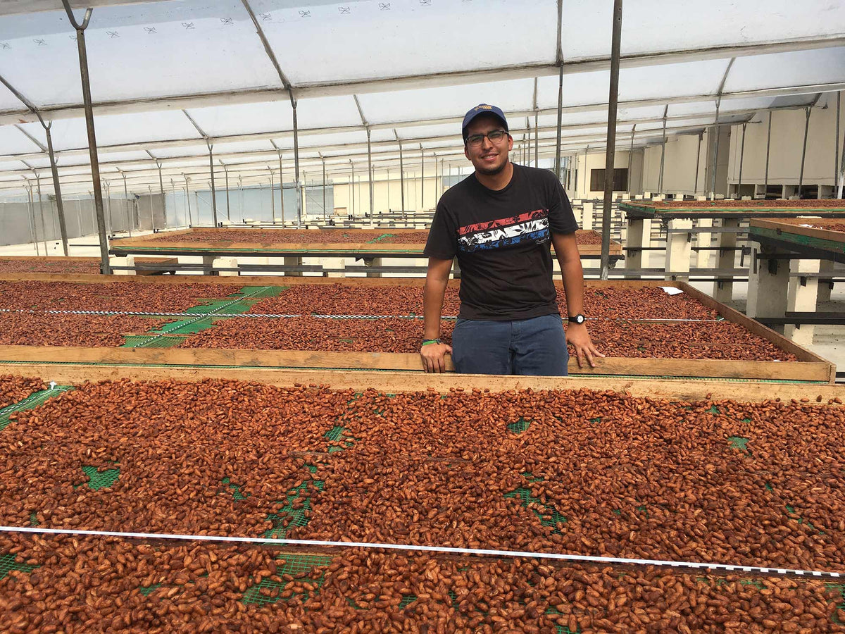 Freddy with the drying racks, which can be easily rolled into or out of the sun.