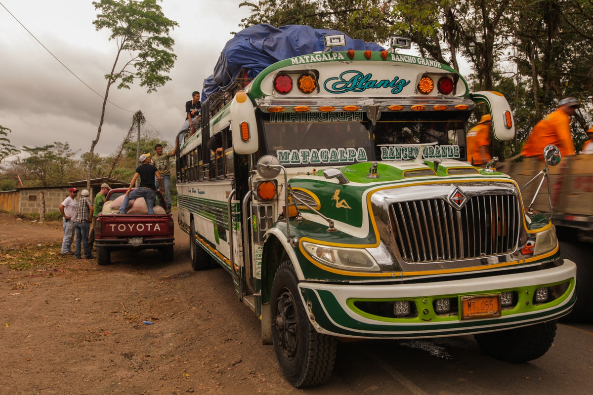 The beans and pulp are removed from the pods, put in sacks, and placed on top of local buses for the short trip to Cacao Bisiesto.